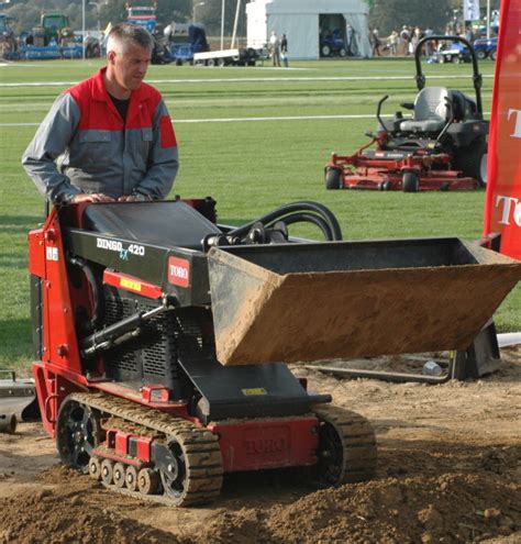 mini skid steer walk behind